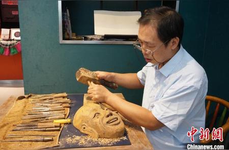 广西桂北的傩面具：木雕艺术中的神秘形象